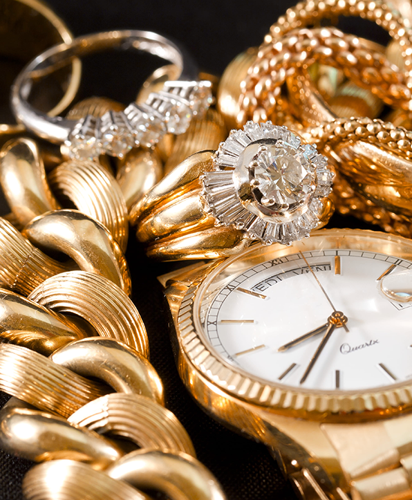 Gold jewelry rings and watch